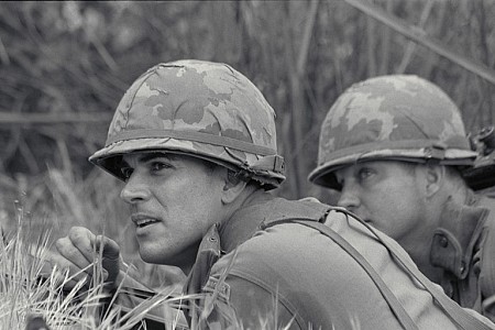 Jsu Garcia as Captain Nadal looks out to Beck, his M-16 gunner at the Creekbed in 