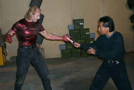 Therion (Trygve Lode) and Dragon (Julian Lee) fight in the warehouse in Dragon and the Hawk.