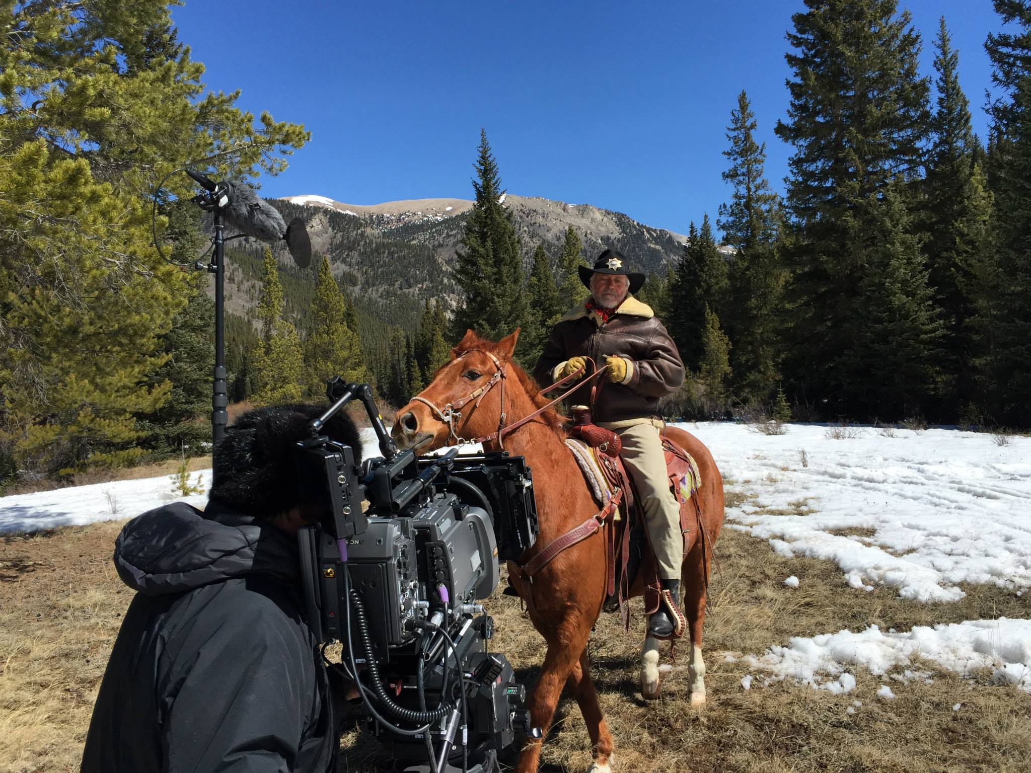 Joe di Gennaro as SHERIFF MILLIS astride his horse 