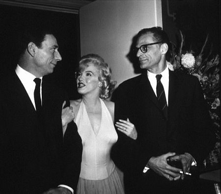 M. Monroe, Yves Montabd & Arthur Miller at party for 