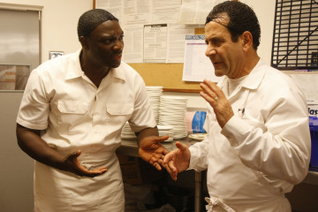 Still of Tony Shalhoub and Adewale Akinnuoye-Agbaje in Monk (2002)