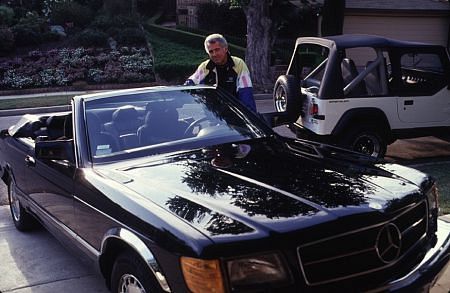 Jed Allan with his 1991 Mercedes convertible