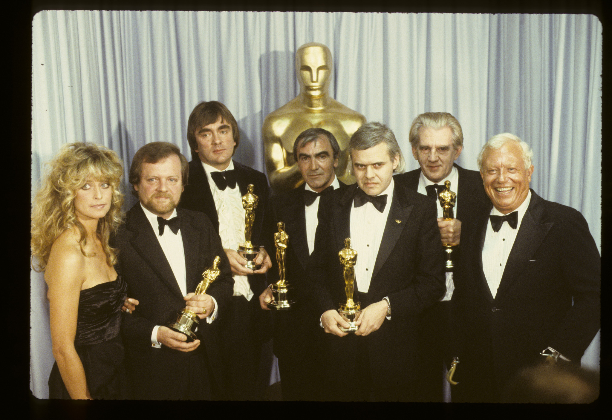 Farrah Fawcett, Nick Allder, Dennis Ayling, H.R. Giger, Brian Johnson, Carlo Rambaldi and Harold Russell at event of The 52nd Annual Academy Awards (1980)