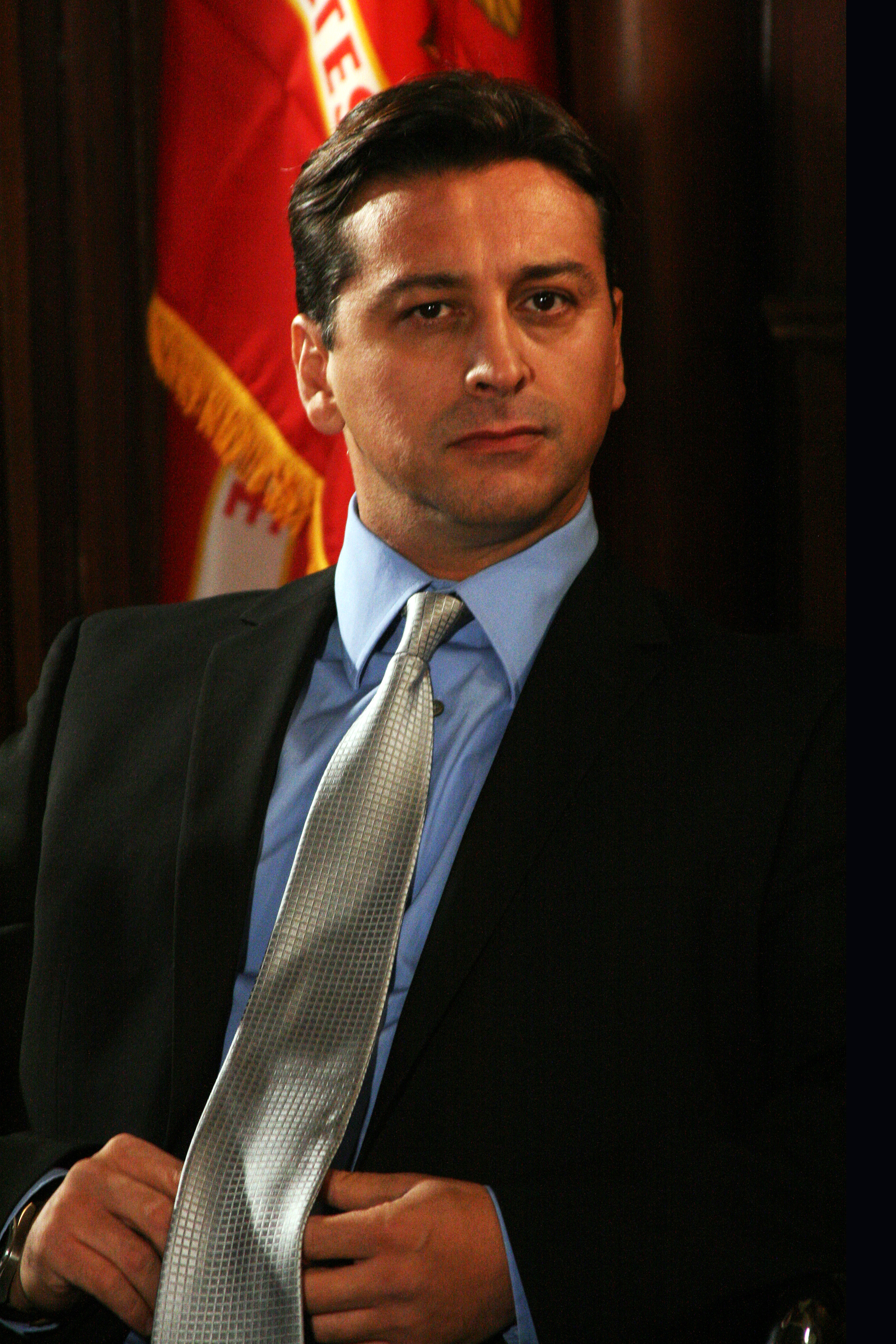 Walter Alza as John Colina in Conduct Unbecoming 2010