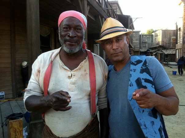K.C. Amos and john Amos putting in work on the set of the western pilot, 