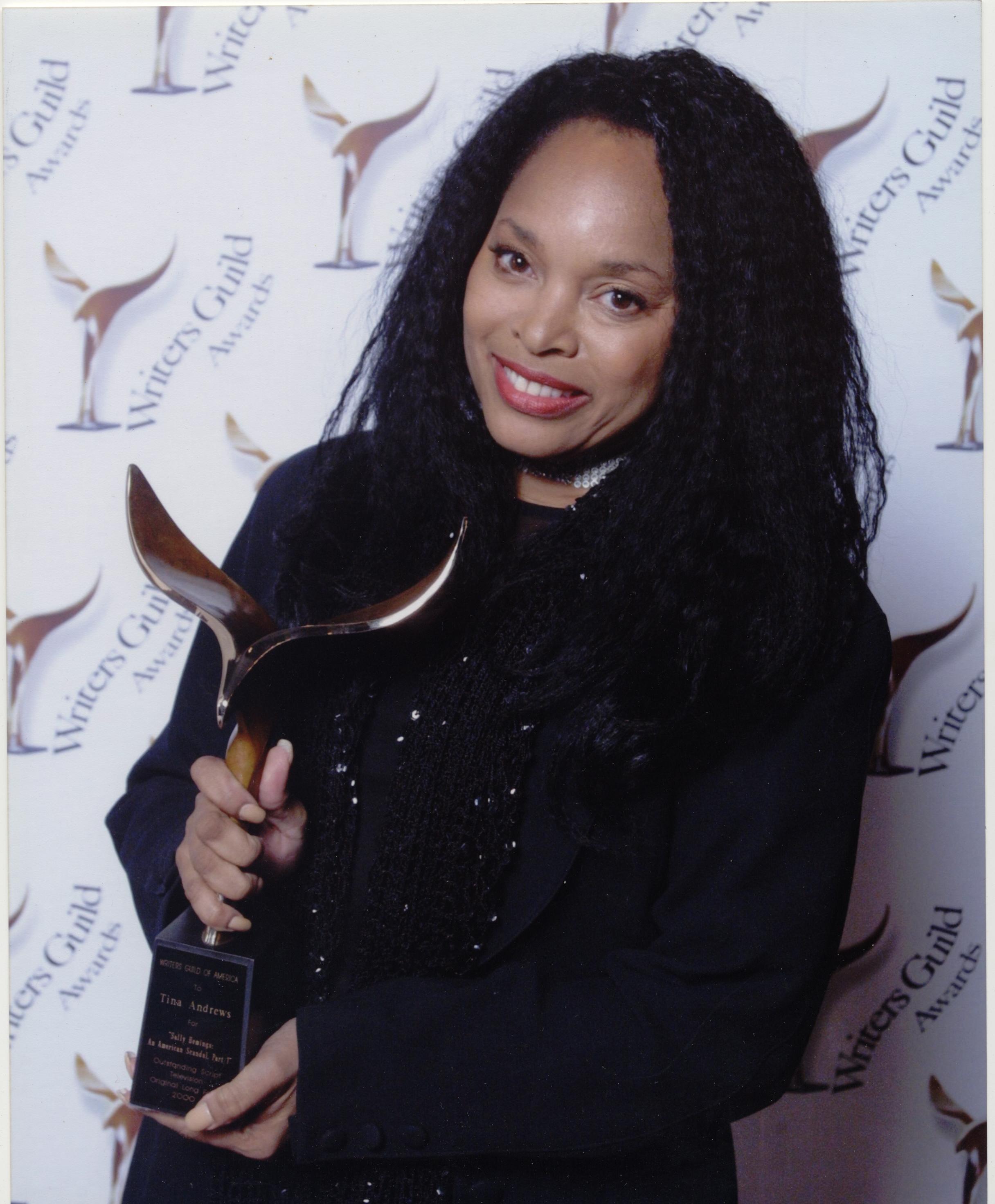 Tina Andrews winning Writers Guild of America award