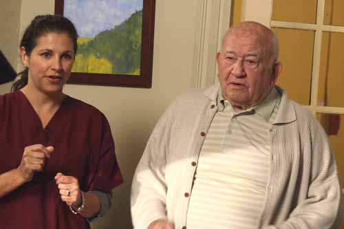 with Ed Asner of the set of 