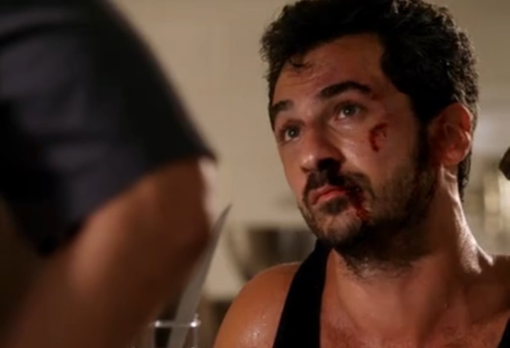 Still of Michael Aronov as resilient baddy in BURN NOTICE