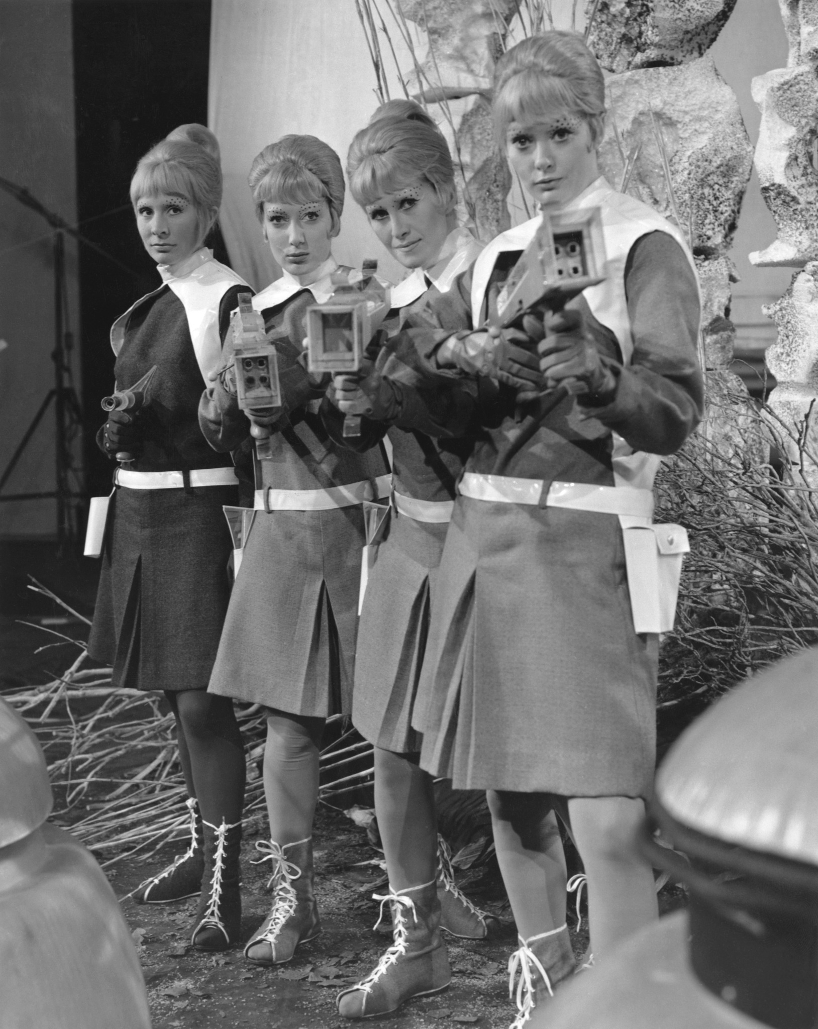 A group of actresses playing 'Drahvins' in 'Galaxy 4', a four-part serial of the popular British television sci-fi series 'Doctor Who', 24th June 1965. The Drahvins are a humanoid alien race dominated by the females of the species. Stephanie Bidmead (1929 - 1974, left) plays the Drahvin leader Maaga, alongside Marina Martin, Susanna Caroll and Lyn Ashley.