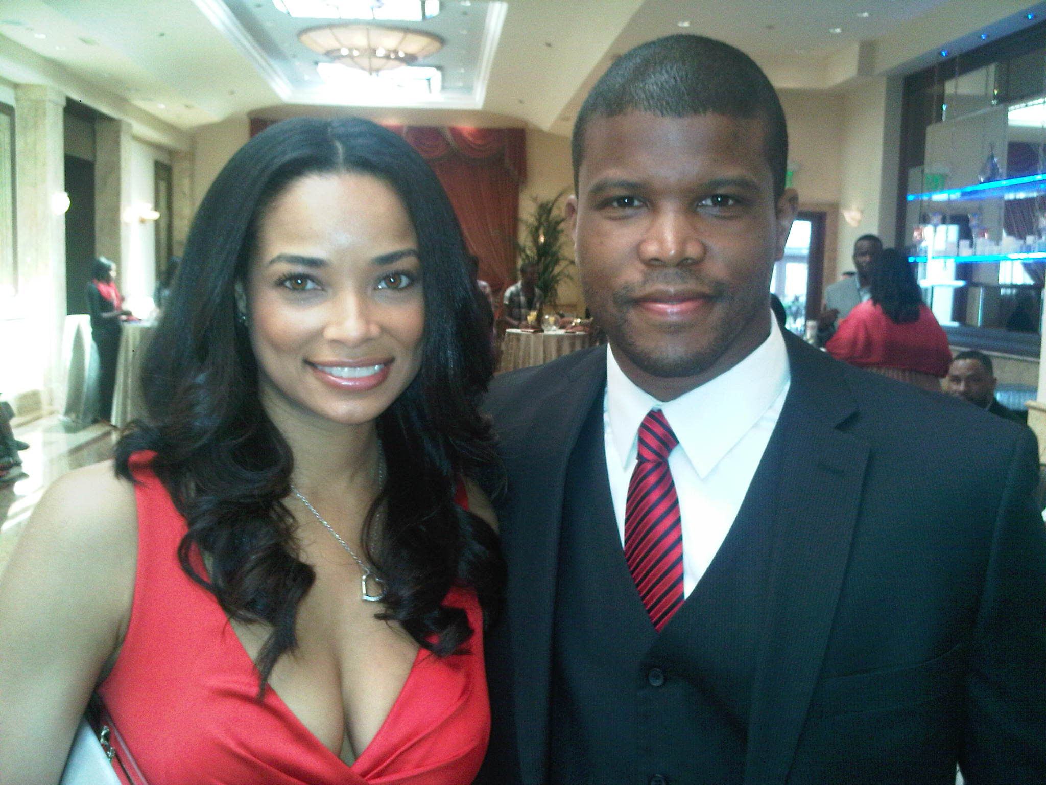 Sharif Atkins with Rochelle Aytes at the 