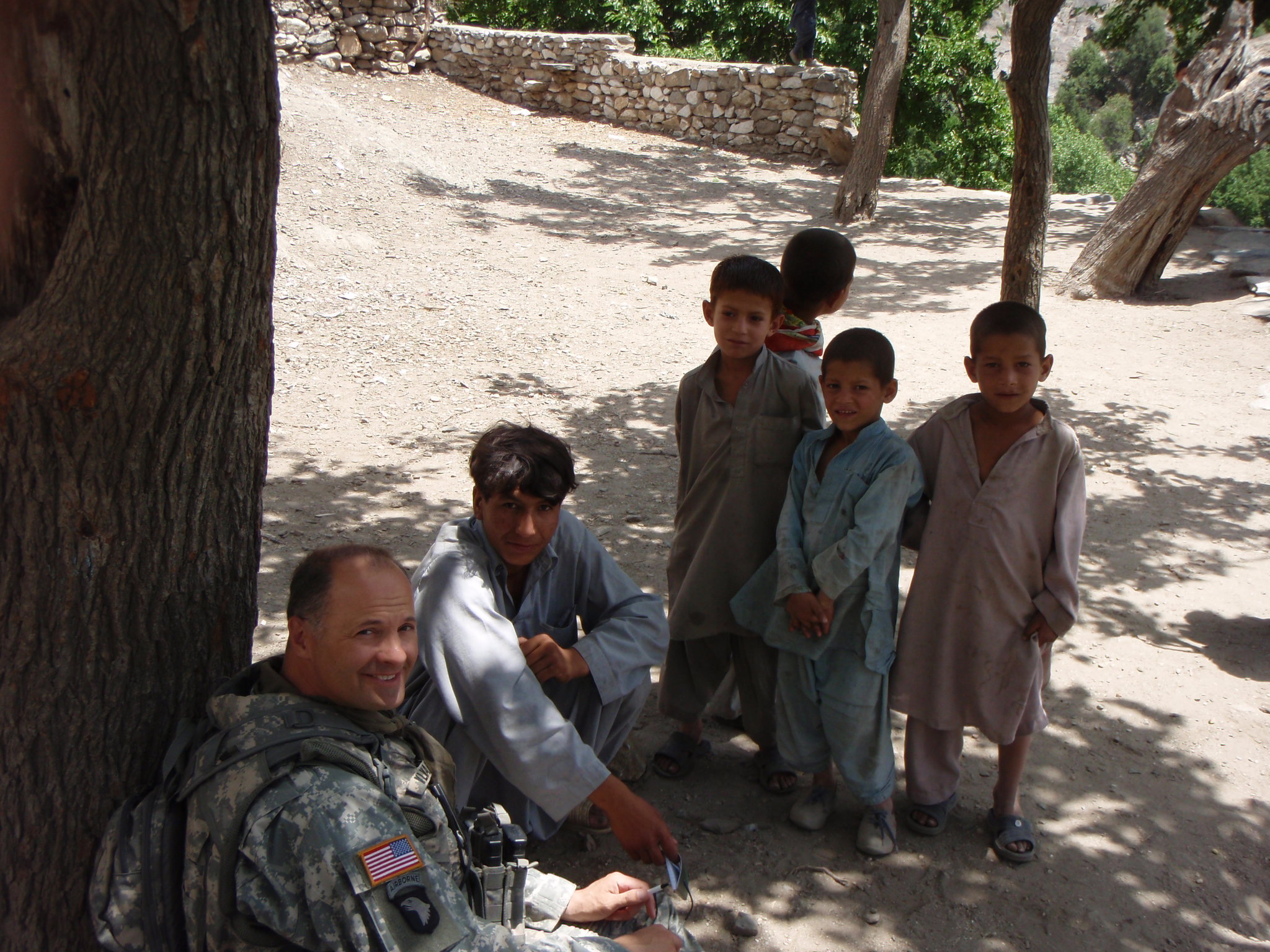 Visiting with Afghan Children while waiting for the Women's shura to end. Village of Zirat, Nuristan Province, Afghanistan.