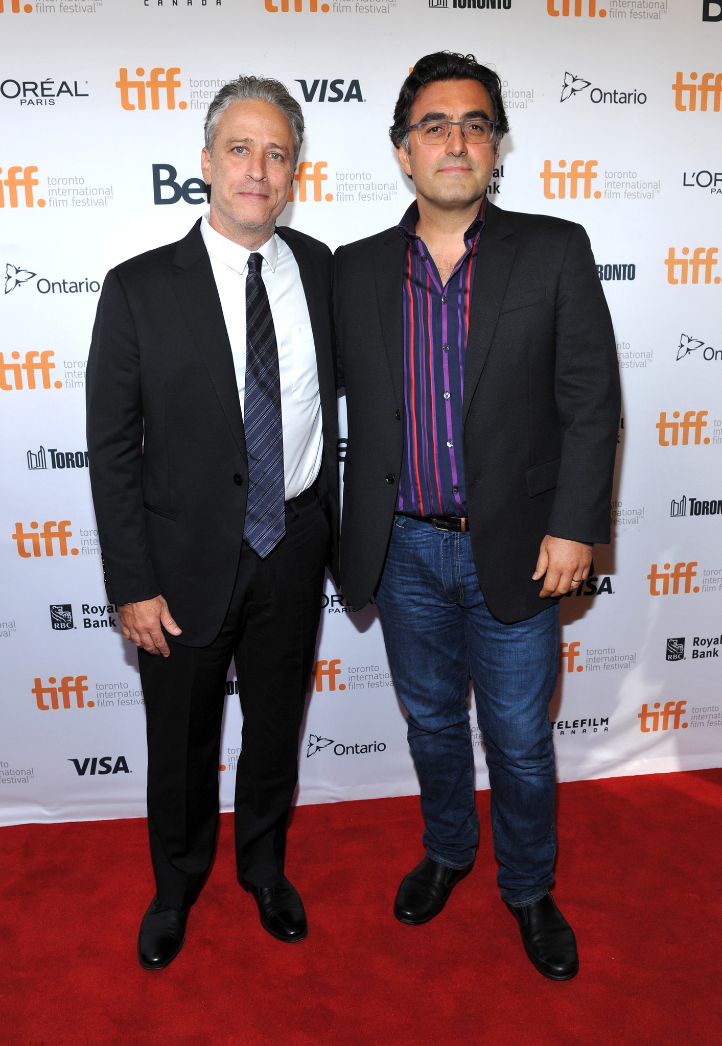 Maziar Bahari and Jon Stewart at event of Rosewater (2014)
