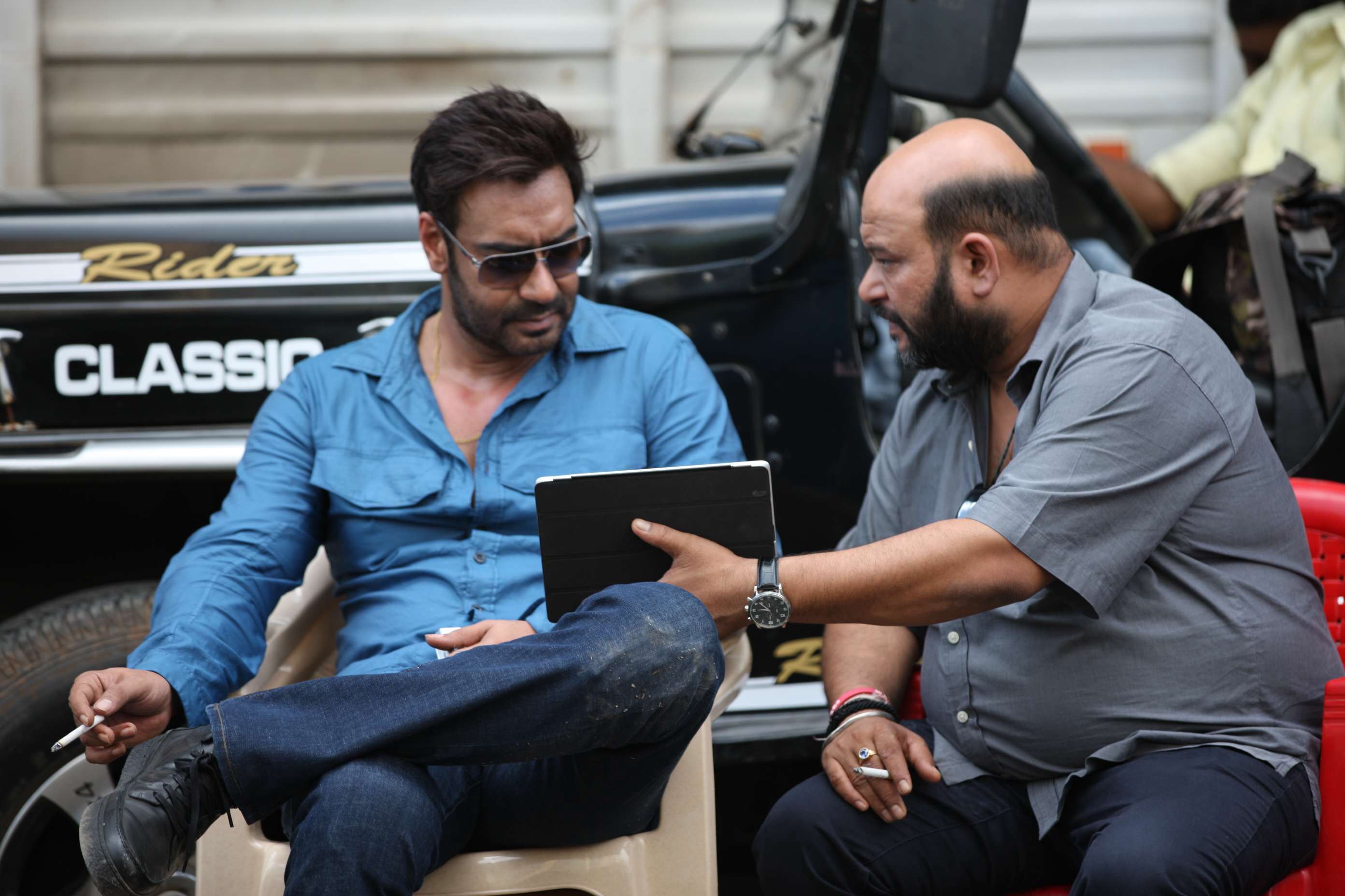 Discussing a project with Boss Mr.Devgn.