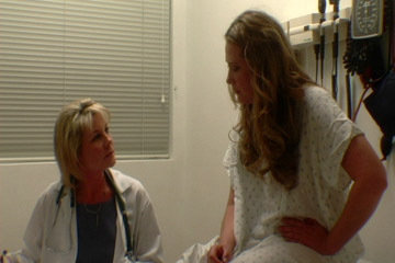 Kandra King as Dr. Sylvia Rhodes with Lane West as Molly Brite in CHANGING SPOTS, 2006