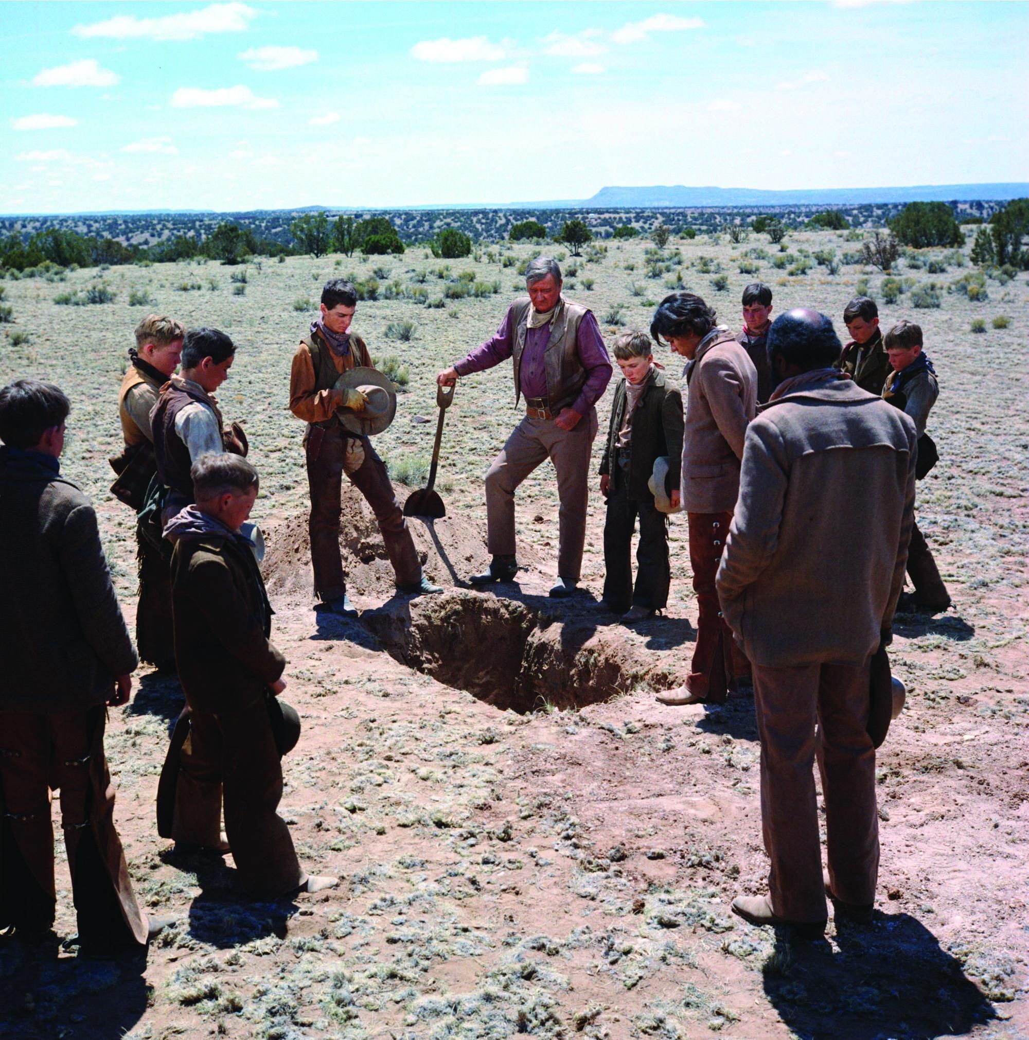 Still of John Wayne, Robert Carradine, Alfred Barker Jr. and Sean Kelly in The Cowboys (1972)