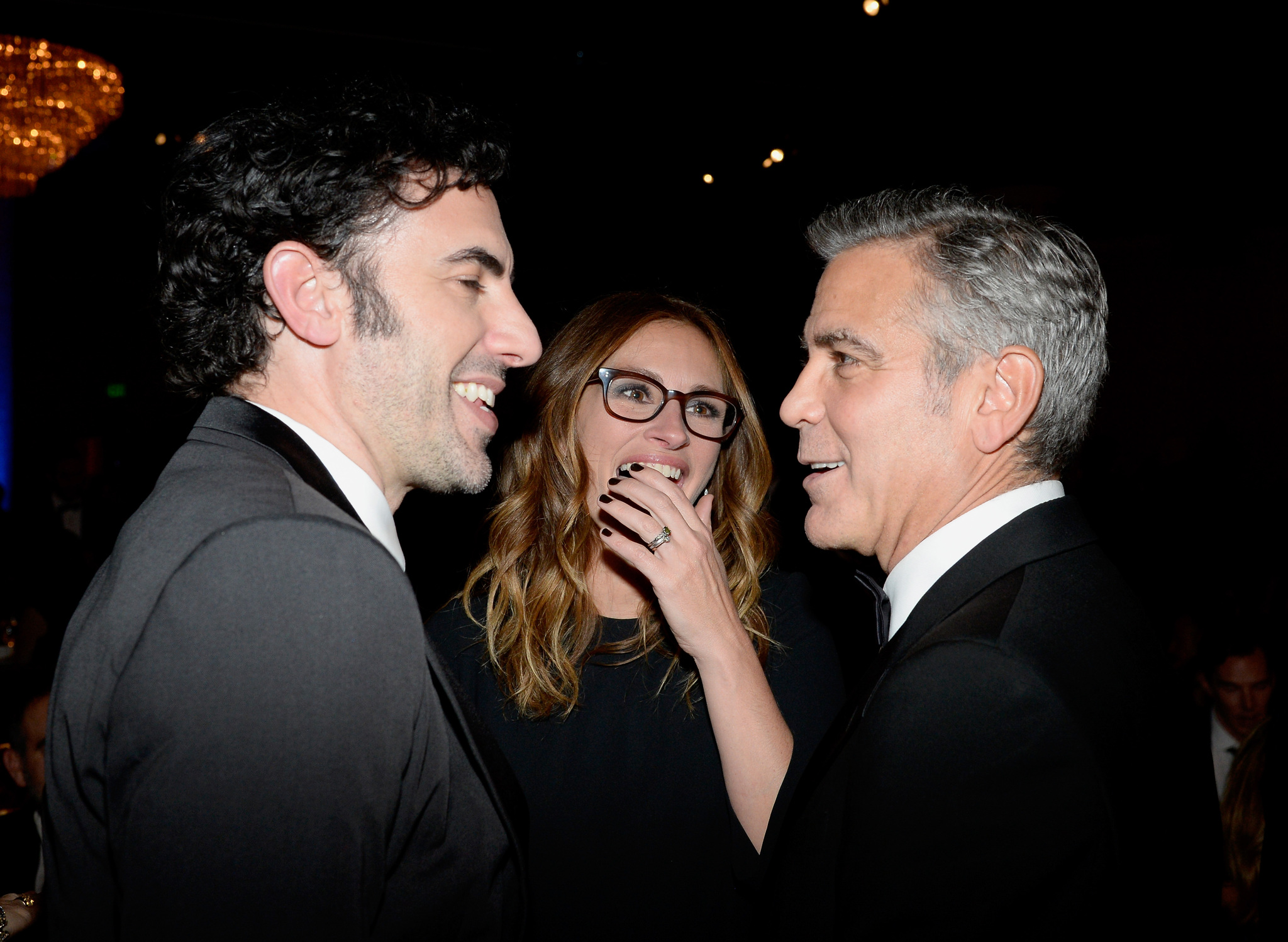 George Clooney, Julia Roberts and Sacha Baron Cohen