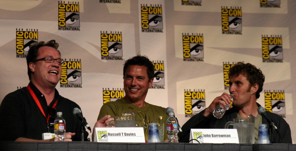 Producer Russell T. Davies, actor John Barrowman, and director Euros Lyn discussing Torchwood at Comic-Con 2009