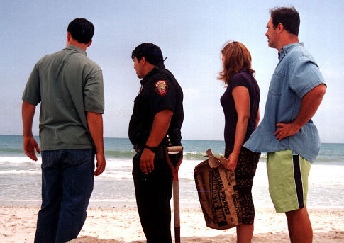 Dale (David Alan Basche), Senna (Patrick Gallo), Paige (CeCe Pleasants) and Seth (Patrick Warburton) seek answers on the beach