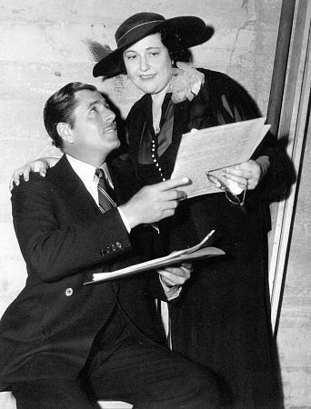 Gossip Columnist Louella Parsons with Warner Baxter, c 1935.