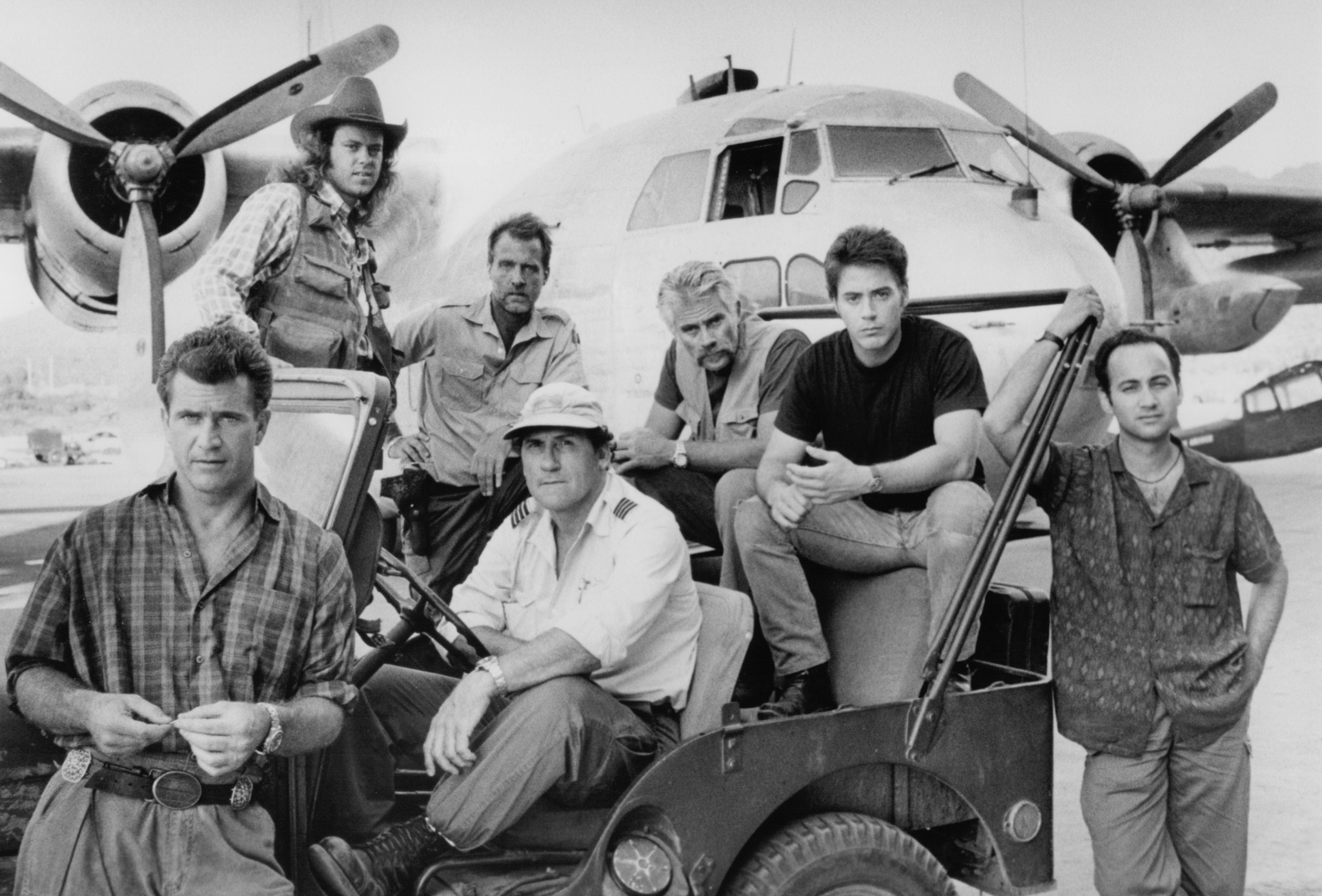 Still of Mel Gibson, Robert Downey Jr., Marshall Bell, Ned Eisenberg, Art LaFleur and Tim Thomerson in Air America (1990)