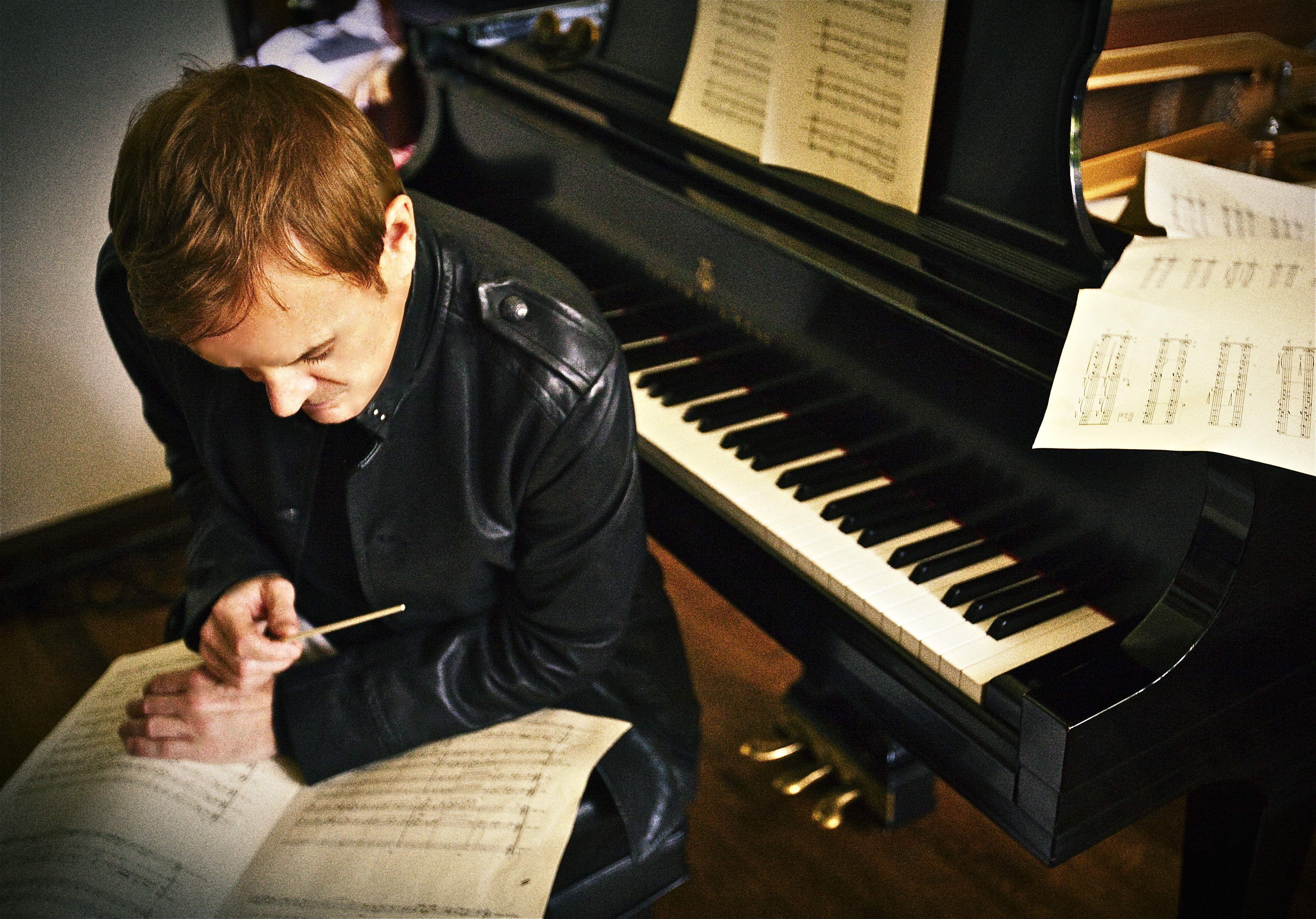 Roger studies his score to Justice/Vengeance which he recorded at Abbey Road Studios conducting the London Symphony Orchestra.