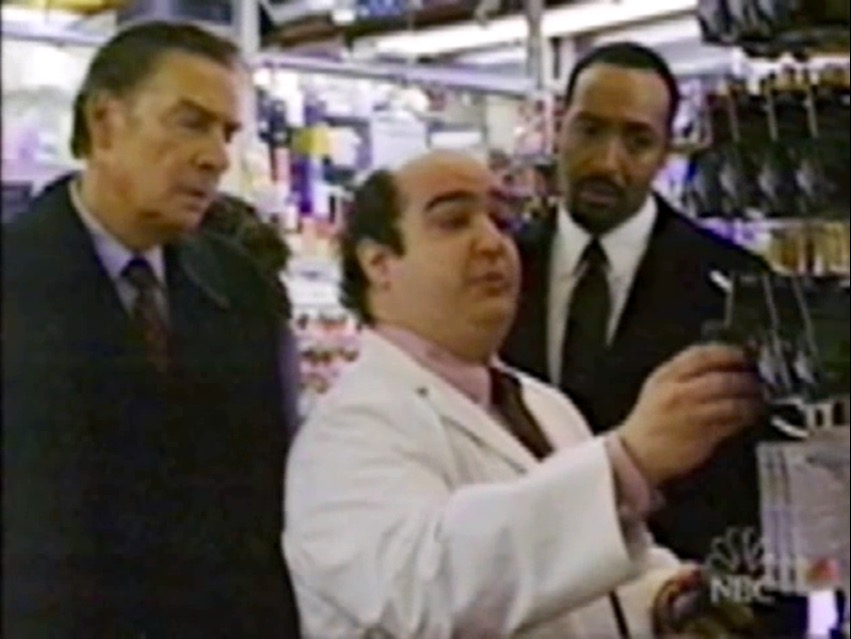 Mike Benitez as Pharmacist Dale Berck on NBC's Law And Order. Pictured Left to Right - Jerry Orbach, Mike Benitez and Jesse L. Martin.