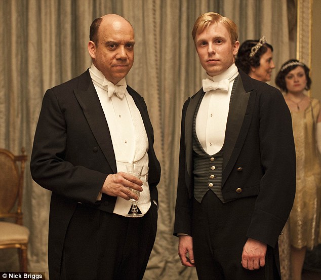 Paul Giamatti as Harold Levinson and Michael Benz as his valet, Ethan Slade.