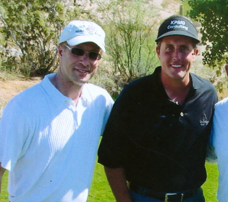 Berris with Phil Mickelson on a set in Arizona. His extensive sports background makes Berris the choice of many top athletes.