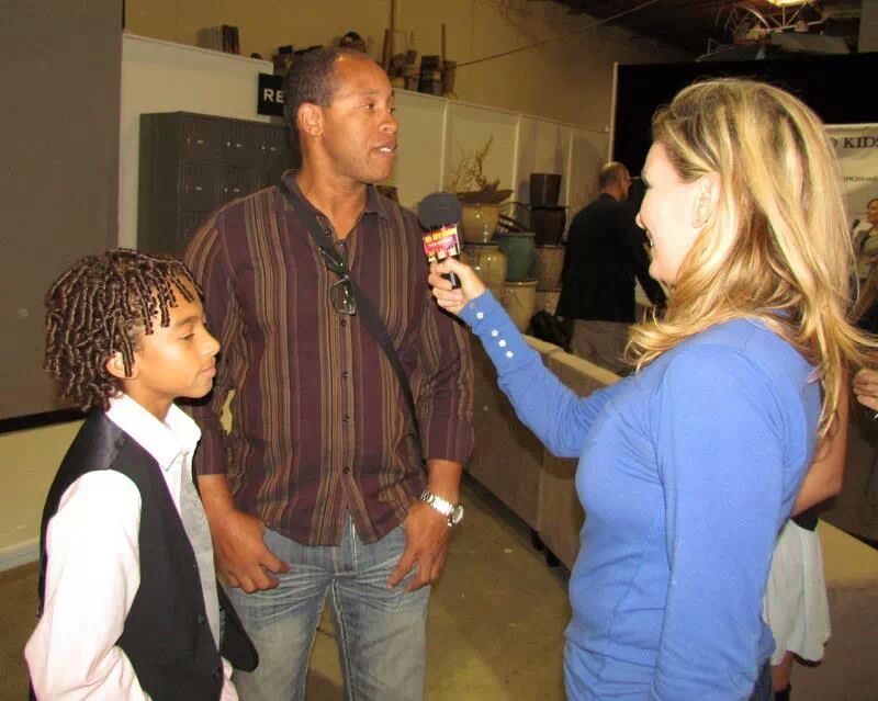 Erik Betts with Presenter and son, Jaden Betts being interviewed at the LA Animal Hero Kids Awards