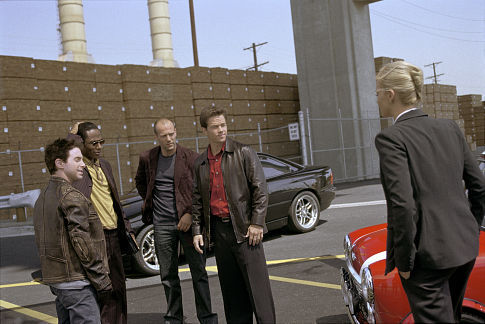 (Left to right) Seth Green as Lyle, Mos Def as Left Ear, Jason Statham as Handsome Rob, Mark Wahlberg as Charlie Croker and Charlize Theron as Stella.