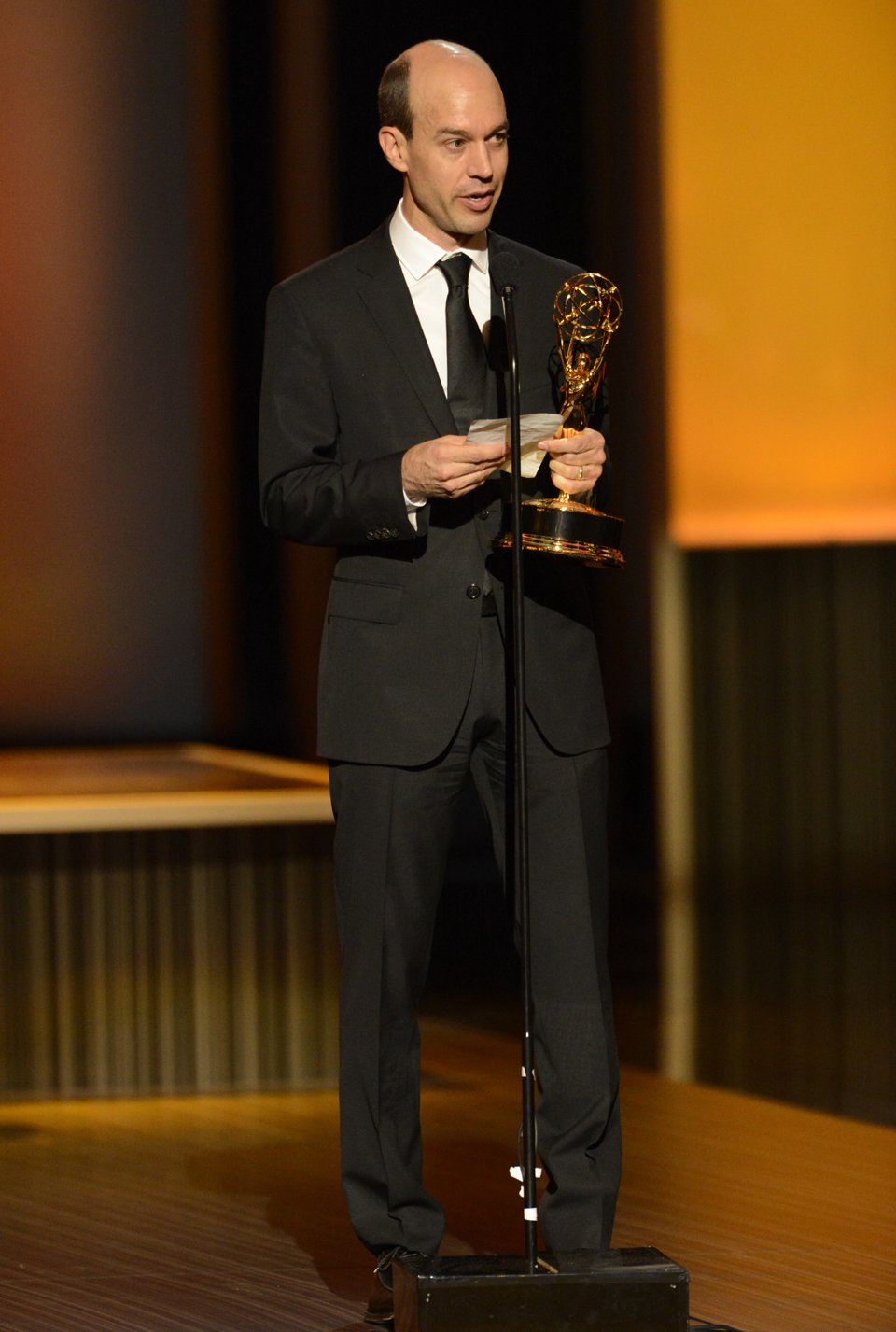 Andy Bialk accepts the award for Outstanding Individual Achievements in Animation for Dragons: Riders of Berk onstage at the 2013 Primetime Creative Arts Emmy Awards, on Sunday, September 15, 2013 at Nokia Theatre L.A. Live, in Los Angeles, Calif.