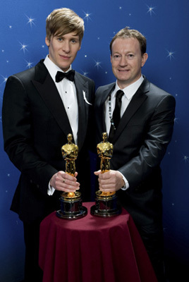 Oscar® Winners Dustin Lance Black (left) and Simon Beaufoy backstage during the live ABC Telecast of the 81st Annual Academy Awards® from the Kodak Theatre, in Hollywood, CA Sunday, February 22, 2009.