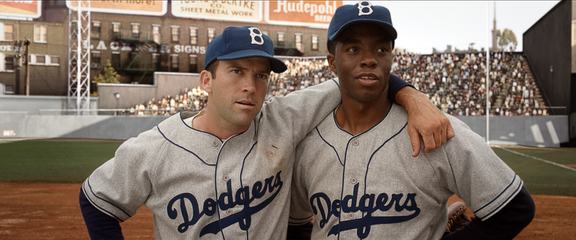 Still of Lucas Black and Chadwick Boseman in 42 (2013)