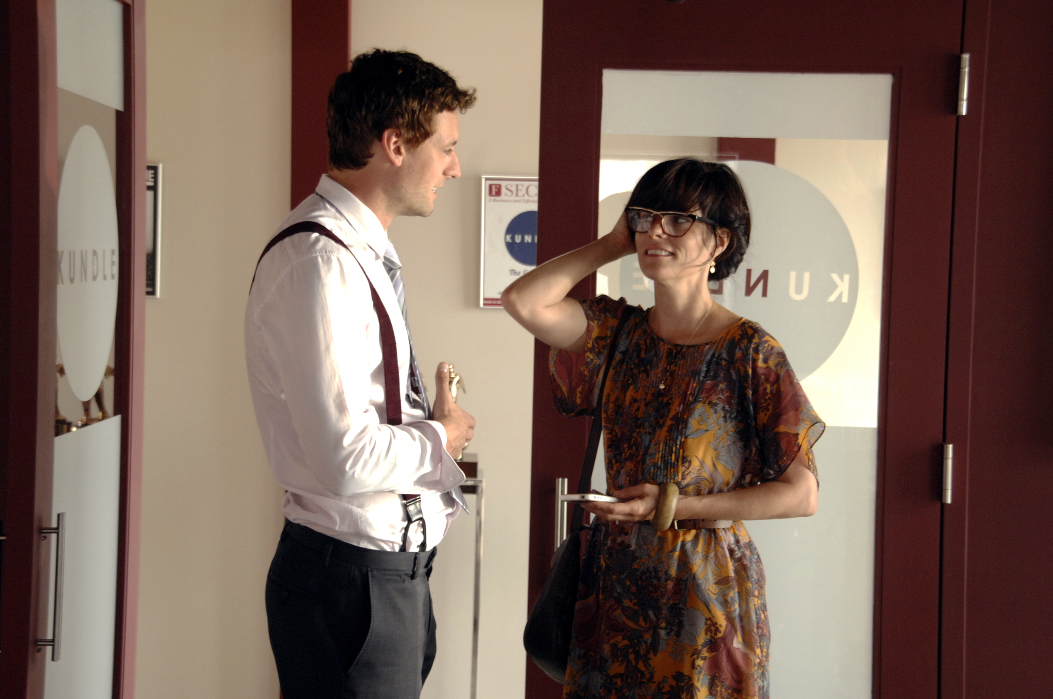 Still of Parker Posey and Callum Blue in And Now a Word from Our Sponsor (2013)