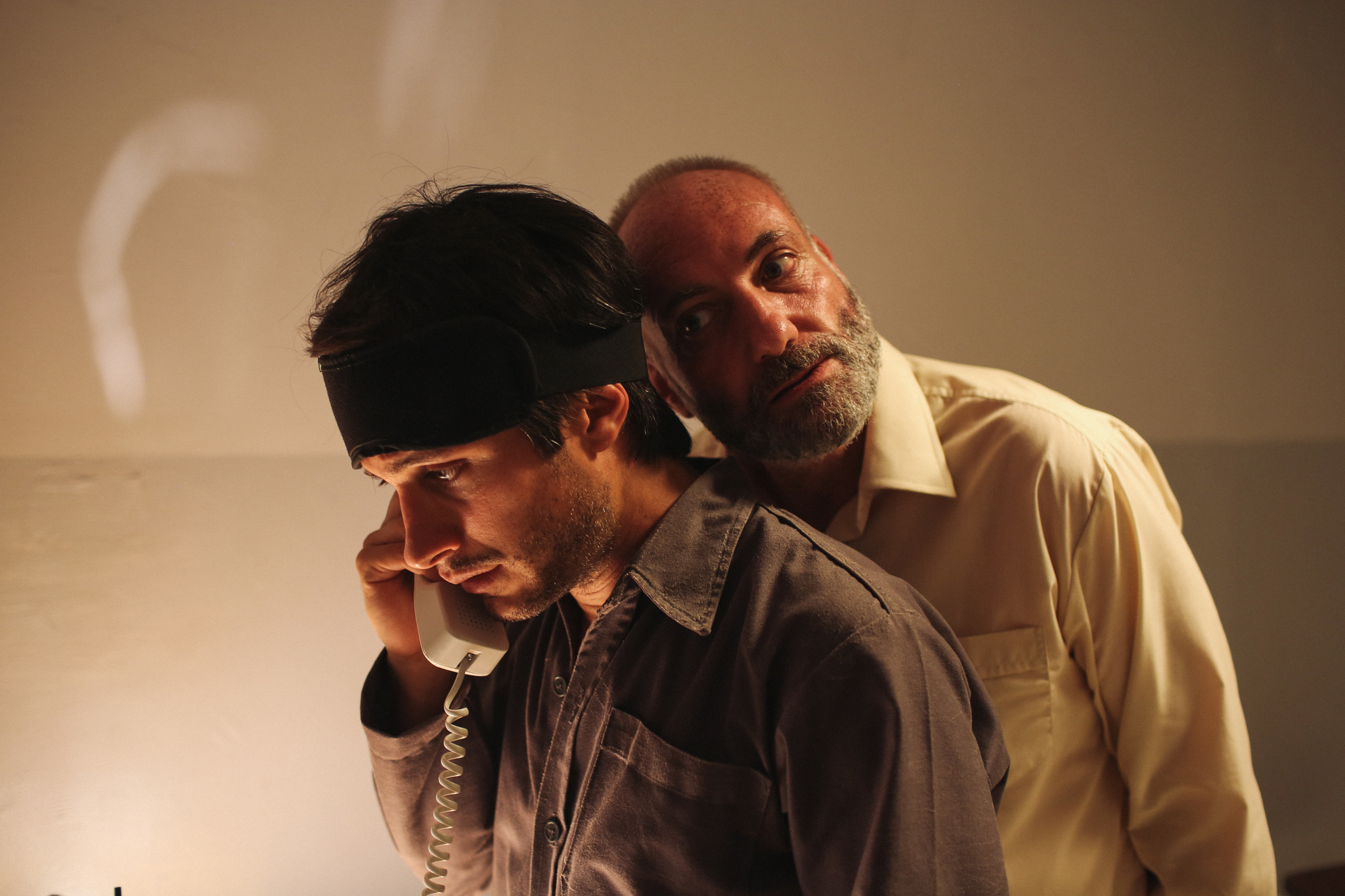 Still of Kim Bodnia and Gael García Bernal in Rosewater (2014)