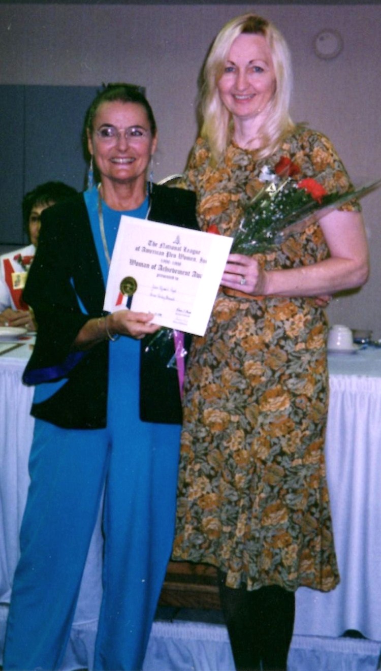 Receiving Woman of Achievement Award from presenter Diantha Ain