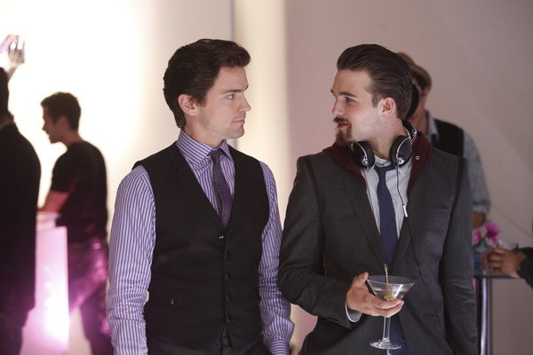 Still of Matt Bomer and Hutch Dano in Aferistas (2009)