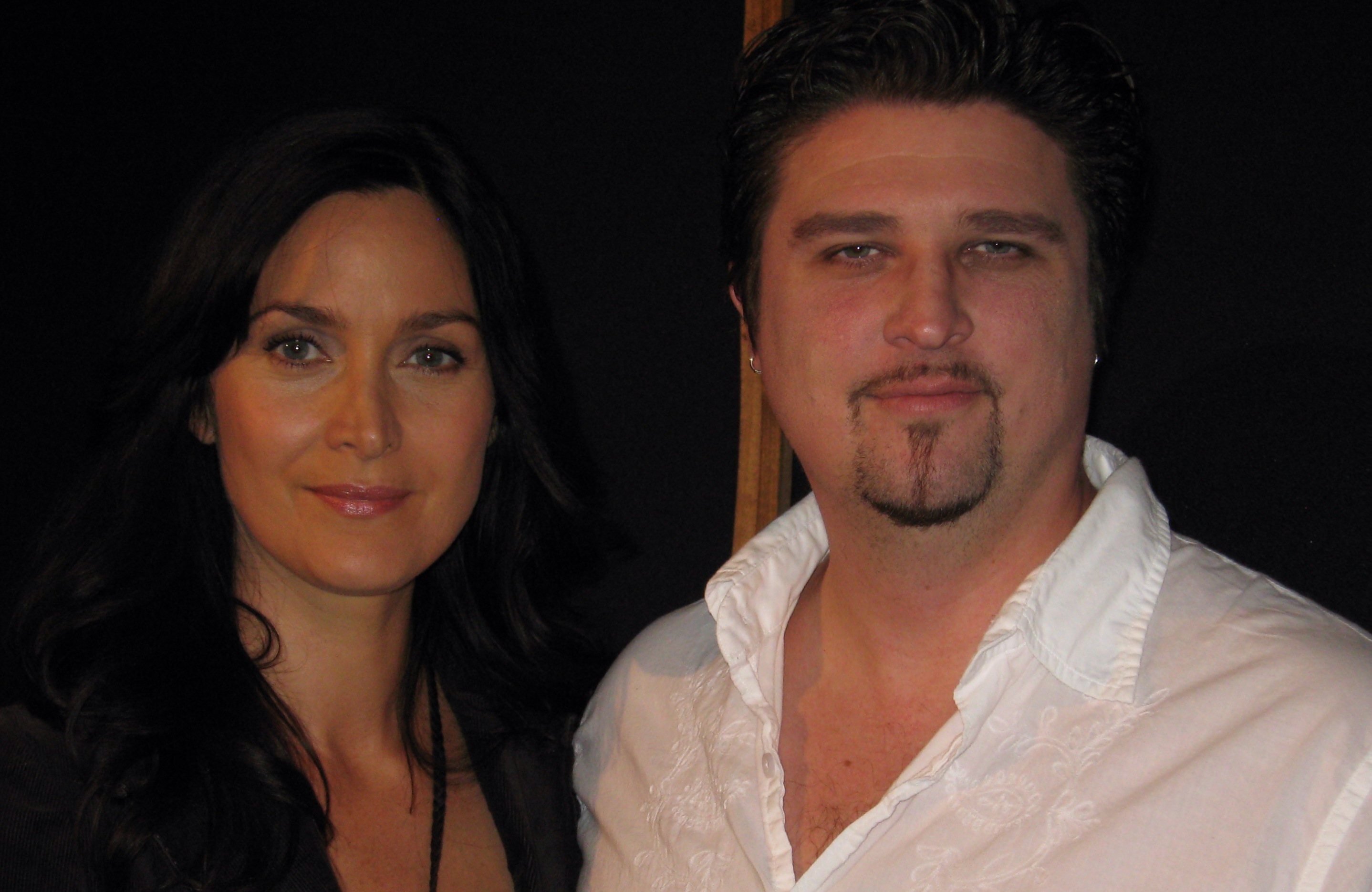 (left) actress Carrie-Anne Moss, and director Chris Borders in the studio for 'Mass Effect 2