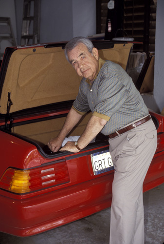 Tom Bosley looking through the trunk of his 1992 500SL Mercedes