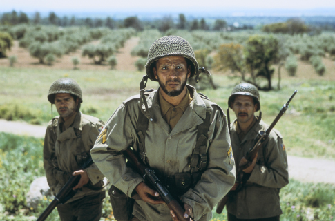 Still of Sami Bouajila, Jamel Debbouze and Roschdy Zem in Indigènes (2006)