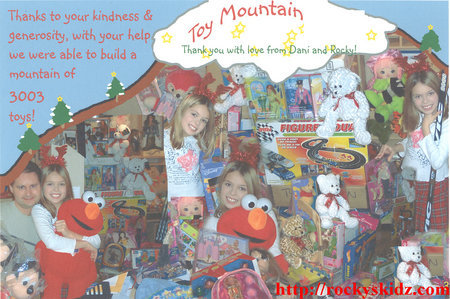 Rocky Stone and Danielle Bouffard collecting toys for the Toy Mountain Campaign