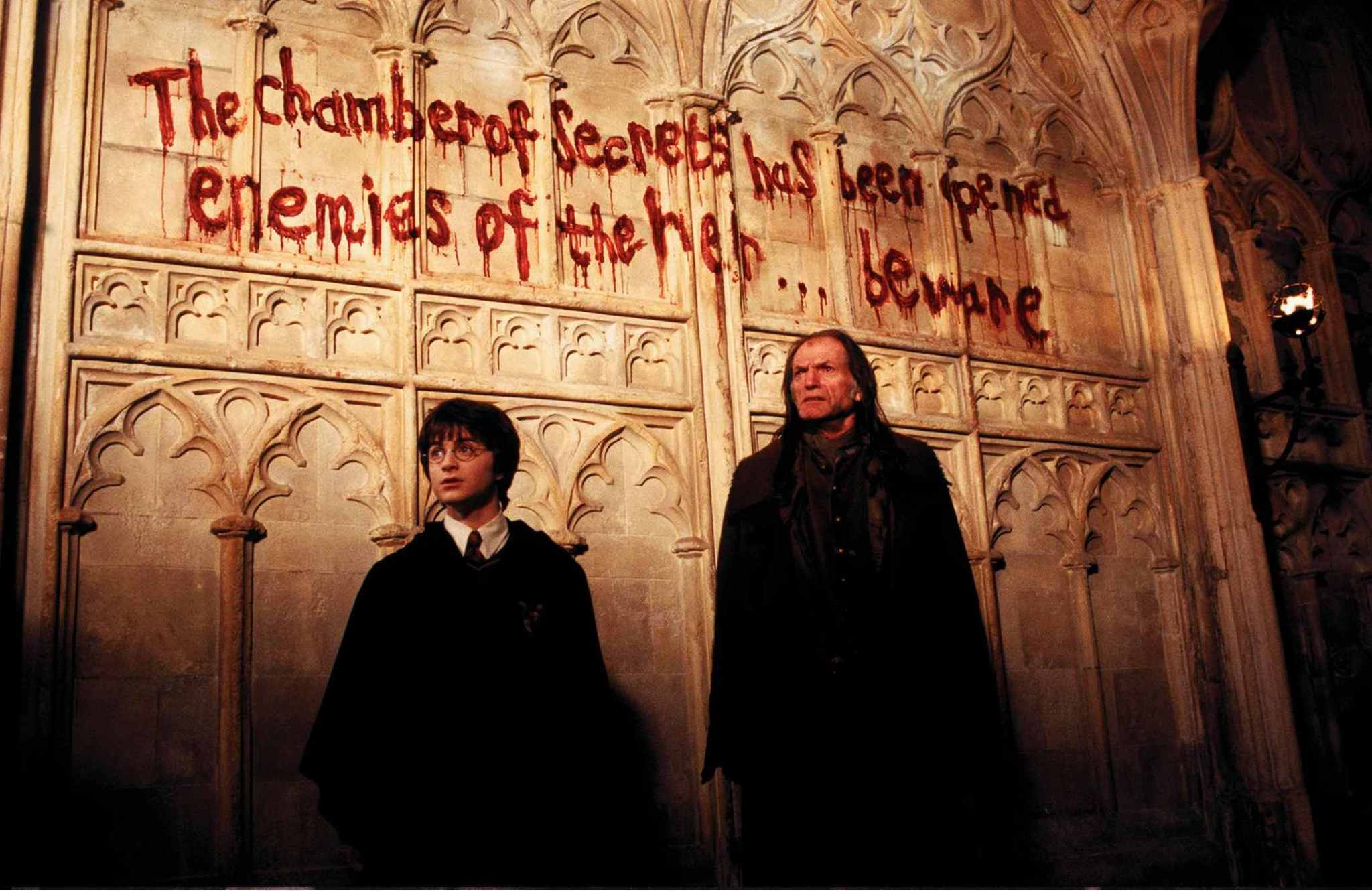 Still of David Bradley and Daniel Radcliffe in Haris Poteris ir paslapciu kambarys (2002)