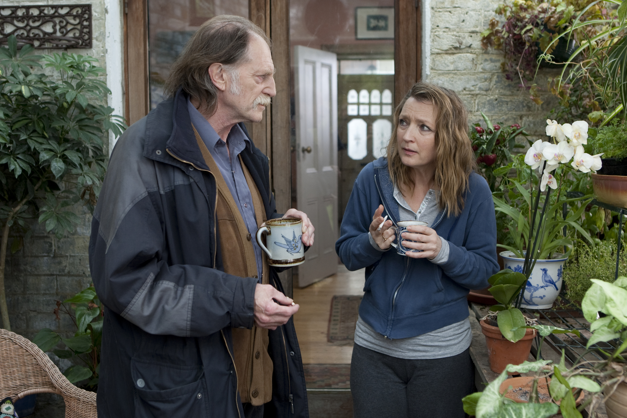 Still of David Bradley and Lesley Manville in Another Year (2010)