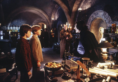 (L-r) Harry (DANIEL RADCLIFFE), Ron (RUPERT GRINT), Filch (DAVID BRADLEY) and Professor Snape (ALAN RICKMAN).