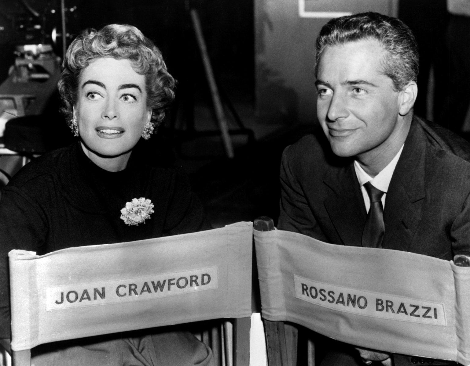 Still of Joan Crawford and Rossano Brazzi in The Story of Esther Costello (1957)