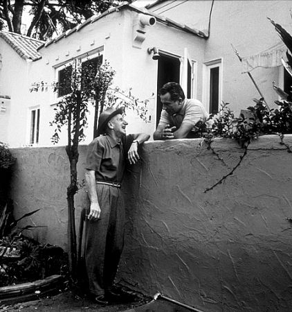 Rossano Brazzi and his neighbor, Jimmy Durante, in his backyard at home in Beverly Hills, CA, 1958.