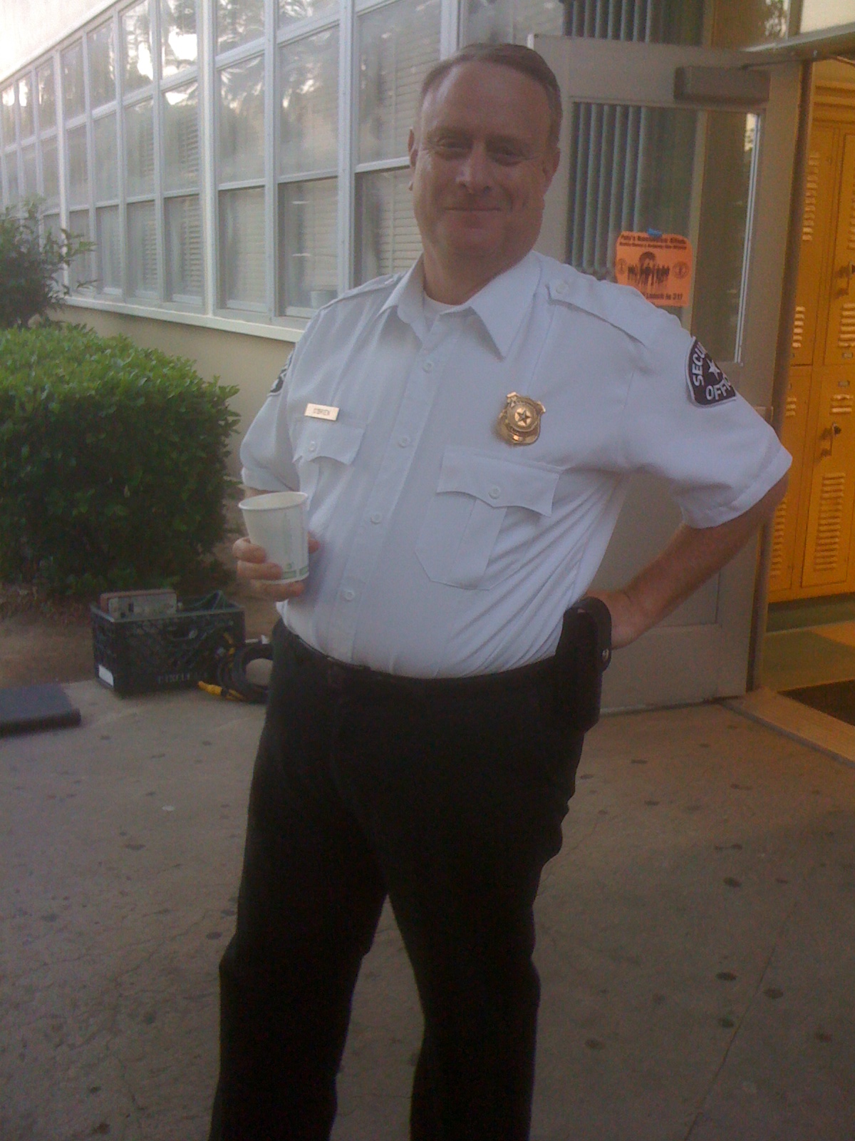 Kevin Brief as security guard on AIM HIGH.