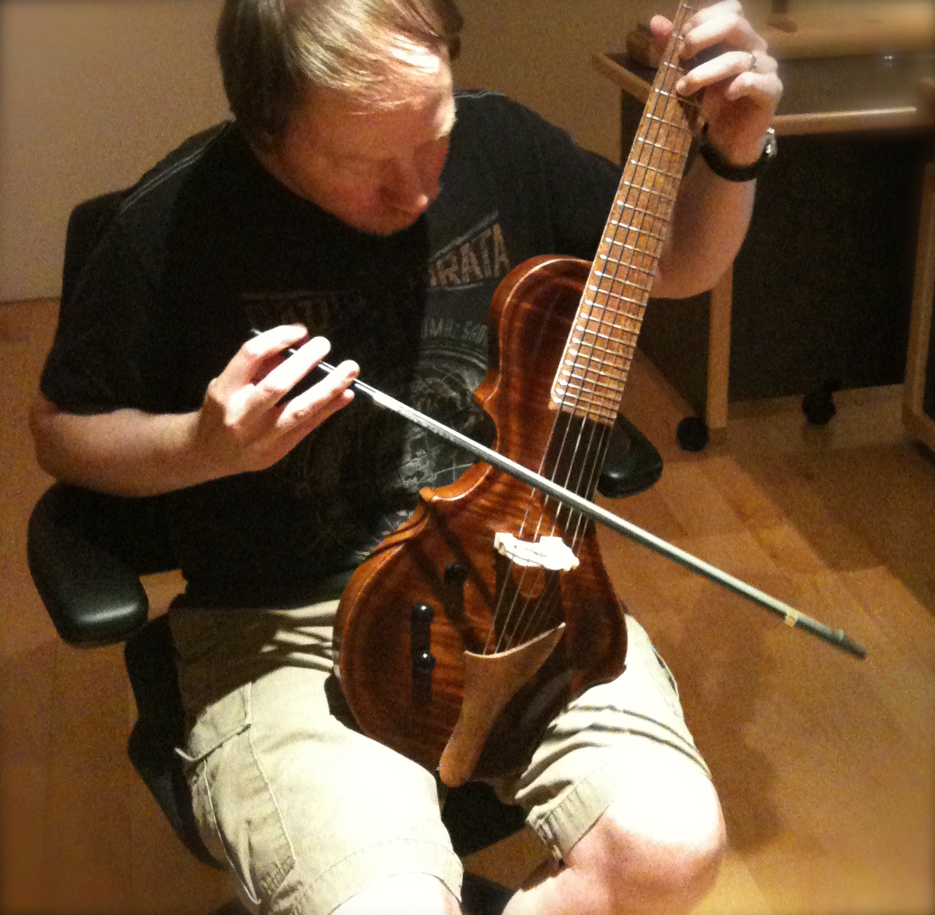 Bill playing the Guitarviol
