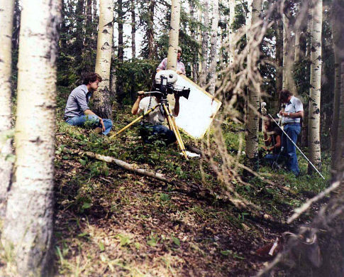 David Winning, Andrew Jaremko (camera), Gordon Merrick (by tree), Donald D. Brown, Frank H. Griffiths. Filming of SEQUENCE, August 12, 1979. West of Cochrane, Alberta.