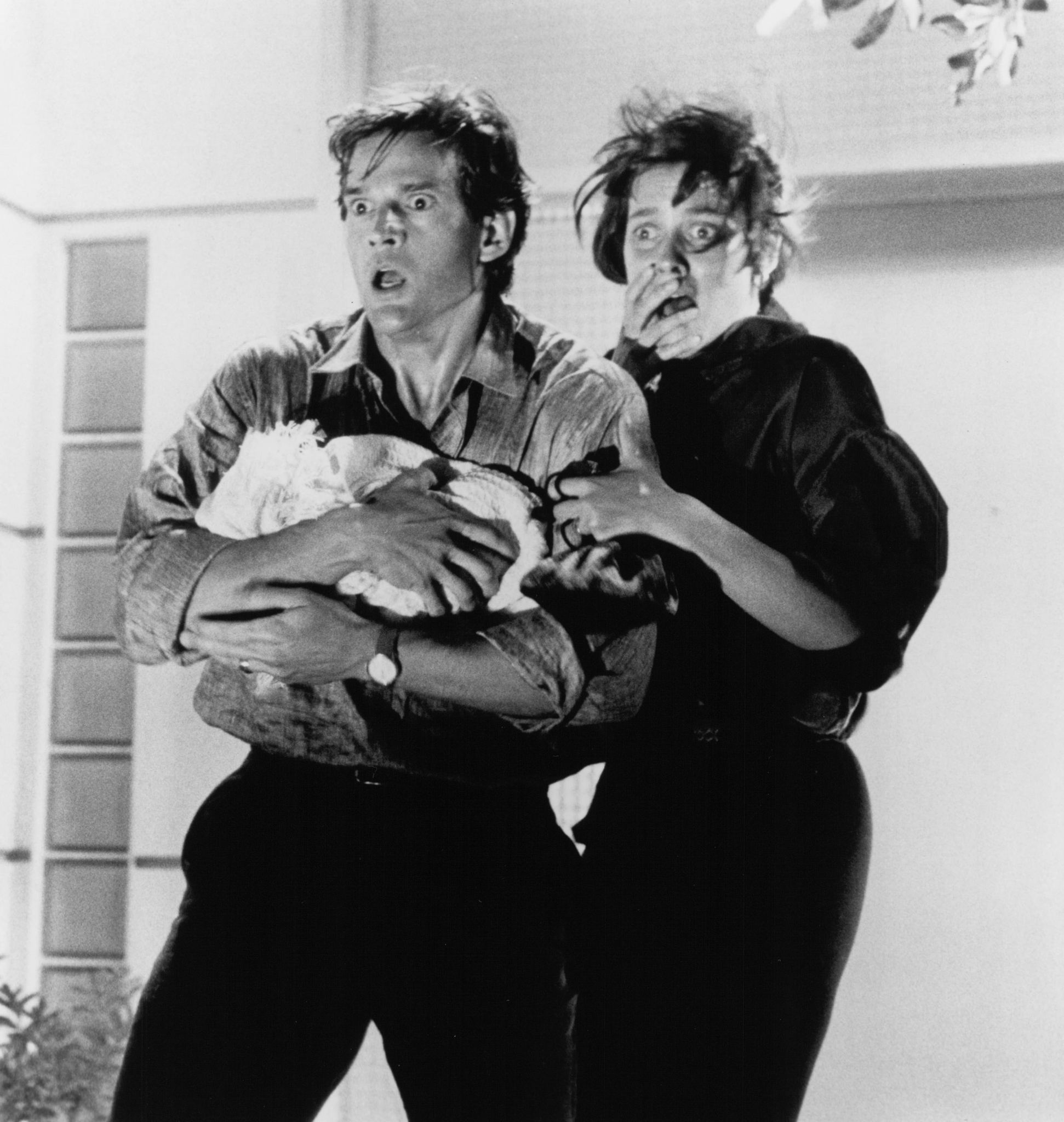 Still of Carey Lowell and Dwier Brown in The Guardian (1990)